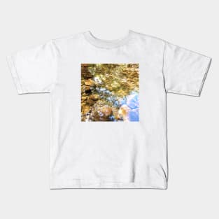 Reflection, lake, trees, pebbles, sparkle, shine, summer, river, aqua, water, spring, holiday, xmas, nature, adventure, rocks, sun, exotic, tropical, blue, turquoise, tan, tree Kids T-Shirt